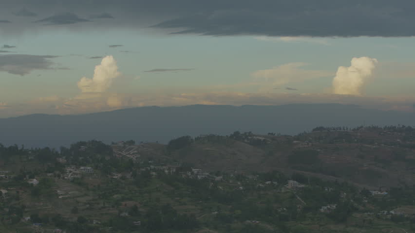 Haitian Country Side, Hills and Houses With Beautiful Clouds