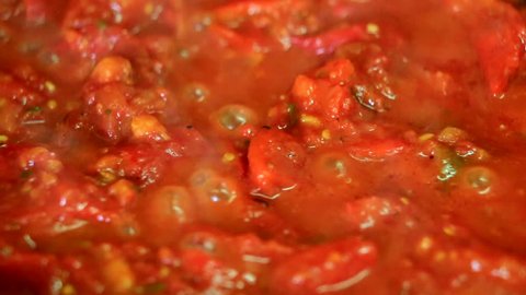 Cooking fresh vegetables - tomato and pepper closeup