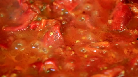 Cooking fresh vegetables - tomato and pepper closeup