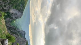 Vertical video. Sunset over the Grand Canyon of Crimea. Zoom. Time Lapse. Natural HDR