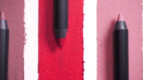 Close up of lip pencils are arranged in shades, beauty goods for woman, nature professional cosmetics, beauty care, makeup tools