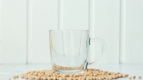 Soy milk being poured into the glass