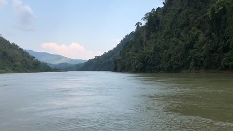 Natural landscape of Mekong River is a muddy color flowing through the mountains, is the border between Thailand and Laos