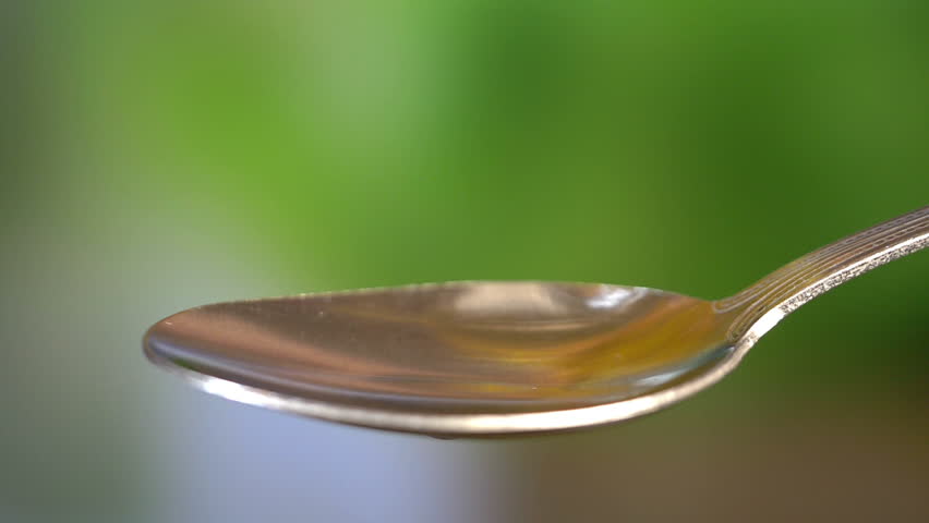 Professional video of dropping olive oil in Slow motion 180 Royalty-Free Stock Footage #1010407058