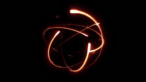 Abstract Fire atom loop circle magic shining or fireballs animation rotation around pattern have sparks effect isolated on black background