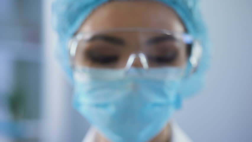 Female scientist holding ampoule in hand, new medication developing, vaccination Royalty-Free Stock Footage #1010430614