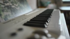Close up of hand man playing piano