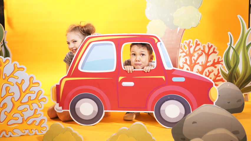 childrens red and yellow car