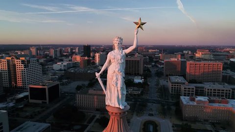 4K Aerial Texas Capitol Austin Orbiting at Sunset - Goddess of Liberty