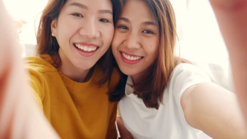 Beautiful young asian woman lesbian happy couple smile to the camera  LGBT lesbian concept.