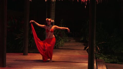 Polynesian pacific Islander woman dance in a tourists cultur show in Rarotonga, Cook Islands.The islanders are of the Maori race linked in culture and language to the Maohi of French Polynesia.