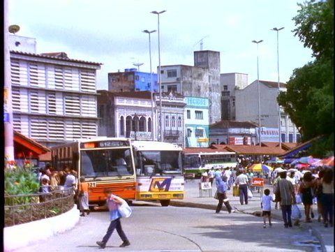 BRAZIL, 1998, Manaus, buses passing, traffic scene with people