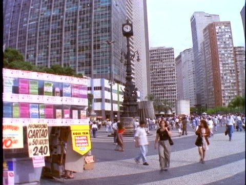 BRAZIL, 1998, Rio de Janerio, downtown business district, crowd, square, clock, kiosk