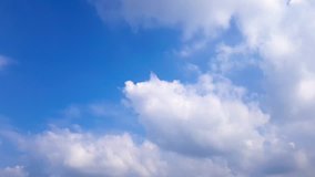 time lapse white clouds on blue sky moving