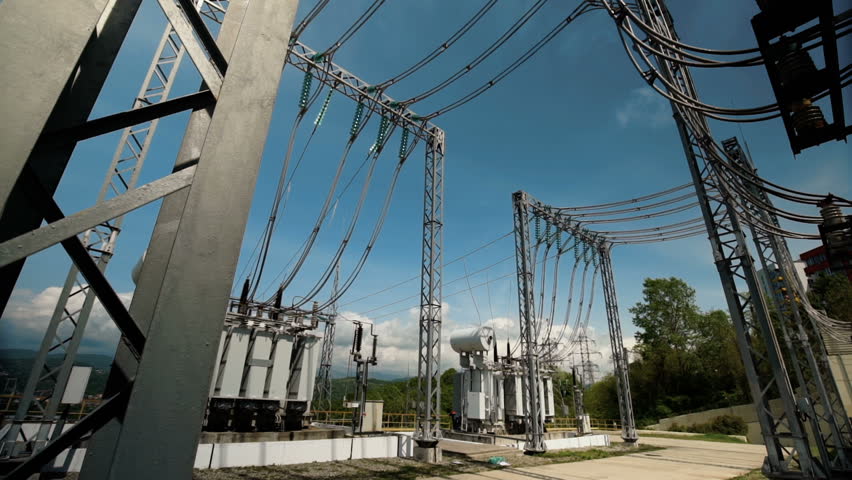 Electric Power Station. High-Voltage Transmission Line Of The Electric Power Royalty-Free Stock Footage #1010460842