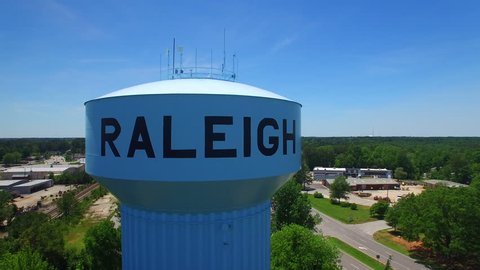 Slow aerial reveal of a water tower in Raleigh North Carolina
