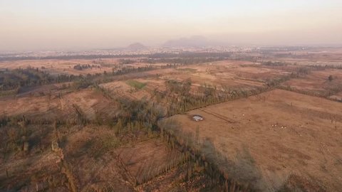Drone shot of Xochimilco fields and chinampas at dusk, Aztec culture legacy 