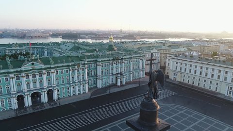 Aerial view on Alexander column and Palace Square in Saint-Petersburg in Russia. The center of the city. Sightseeing. Early summer morning near Hermitage - Winter Palace.