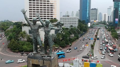 Ungraded Aerial Footage of Selamat Datang Monument in Jakarta, Indonesia.