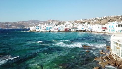 Aerial drone bird's eye view video of iconic little Venice in chora of Mykonos island, Cyclades, Greece