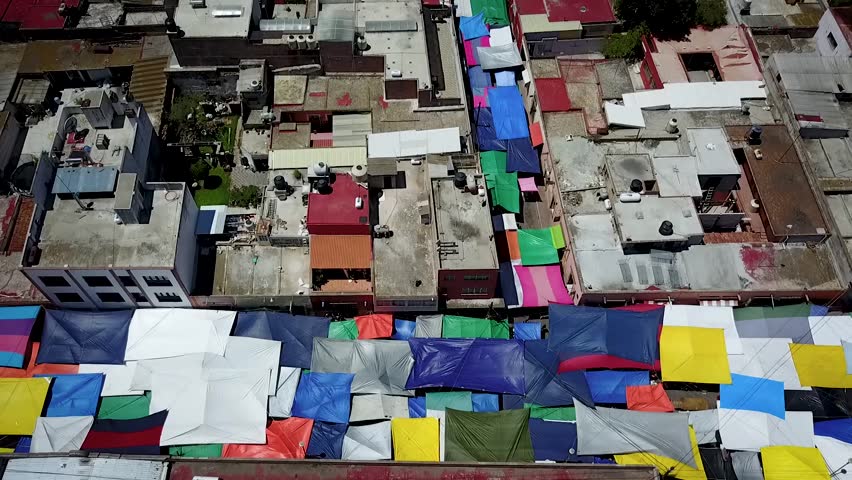 Aerial view of flea market in Huichapan, Mexico, a town just outside Mexico City. People gather around the town center and market during the weekends.