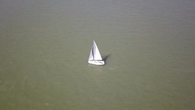 Drone view of a sailboat sailing off the Brittany coast France
