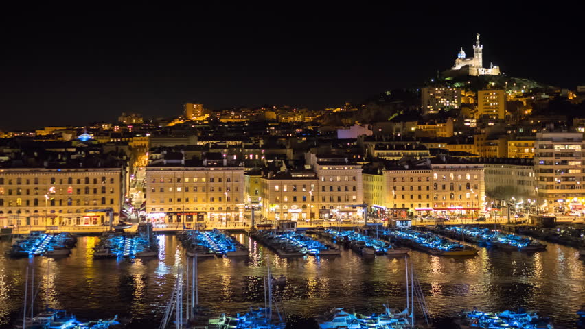 marseille city skyline at night old port pan timelapse