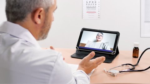 doctor having chat online with patient prescribes