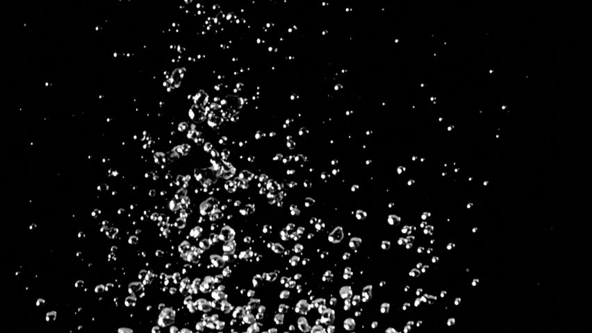 Splashes of water and droplets falling. Black background. Slow motion | Shutterstock HD Video #1010536388