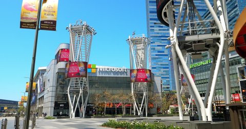 LOS ANGELES, CALIFORNIA, USA - APRIL 22, 2018: Microsoft former Nokia Square, Ritz Carlton Hotel and electronic digital billboards at L.A. LIVE in Los Angeles, California, USA, 4K
