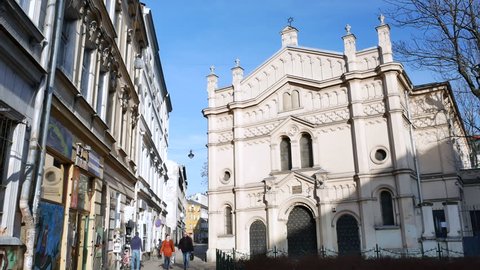 KRAKOW / POLAND - JANUARY 9, 2018: Tempel Synagogue in Kazimierz district, Krakow. Sunny winter day. Pan.