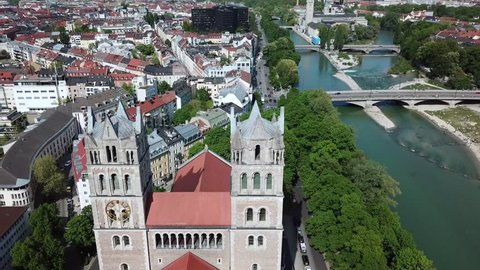 Aerial drone view of the St. Maximilian church next to river Isar in Munich Bavaria, Germany