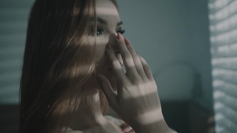 Woman taking off her bra Stock Video Footage - 4K and HD Video Clips