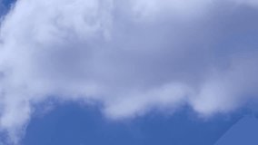 Daily formating white clouds time lapse, blue soft transparent sky in horizon, nice rotating, fast motion cloudscape, panoramic view.