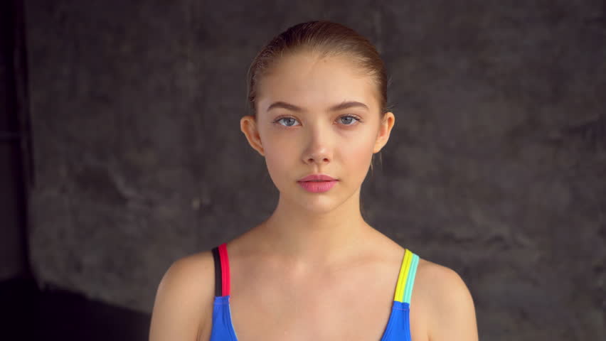 Fitness young sporty champion teen girl. Portrait closeup. 4 k gymnast girl