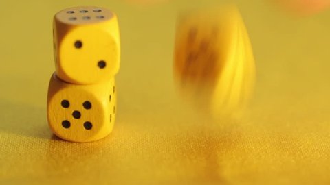 Yellow wooden chips dice. Three Dice roll