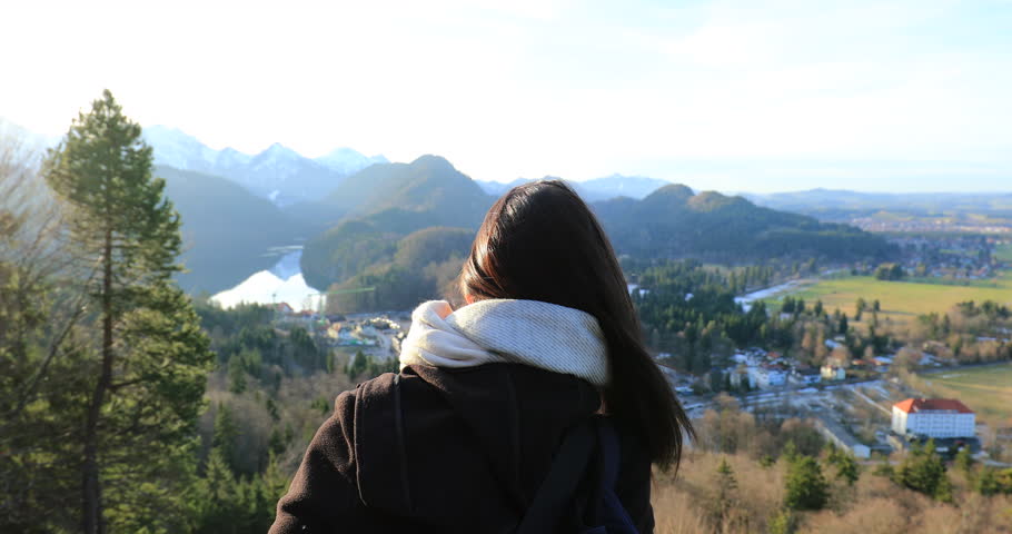 Woman looking at beautiful landscape scenery