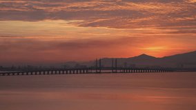 Morning View of Penang Bridge, Penang city sunrise video Time-lapse in 4K
