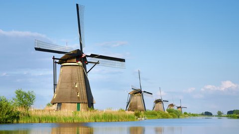 A row of windmills at the famous Dutch UNESCO World Heritage Site Kinderdijk / Molenwaard, South Holland, Netherlands. Shot with RED Weapon Helium 8K camera.