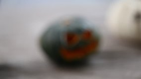 Various style of Halloween pumpkin funny face closeup blurry background