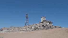 HD quality summer day rocky Shark Island Resort's Lighthouse video in small harbour town Luderitz at Atlantic Ocean coast in Namib Desert Sperrgebiet area in the south of Namibia, southern Africa