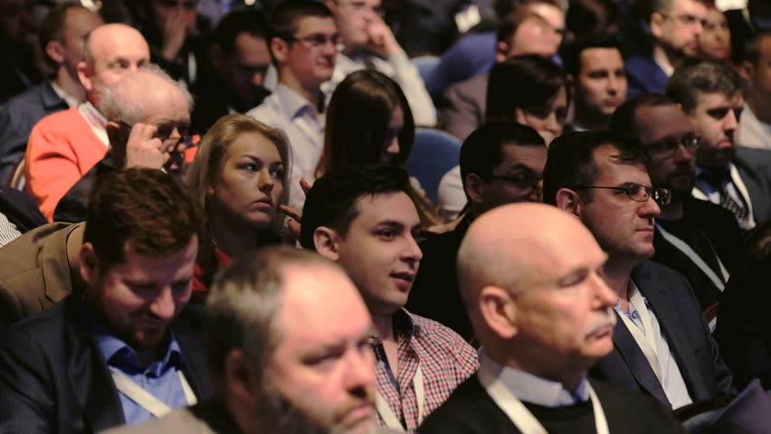 Moscow, Russia - March 27: Audience listens to the lecturer at the conference hal at Blockchain Congress 2018 | Shutterstock HD Video #1010637614