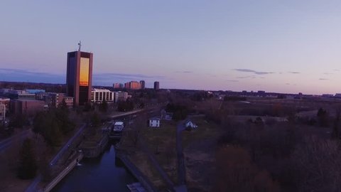 Sunset reflecting off Dunton Tower at Carleton University. Aerial shot.