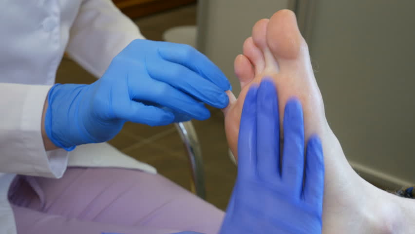 Foot treatment with cream after peeling. Close up | Shutterstock HD Video #1010644322