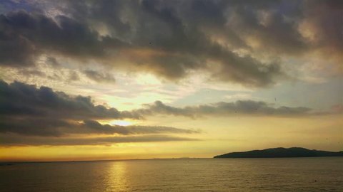 Beautiful golden sunrise on the sea with cloudy day, Static shot, 4K