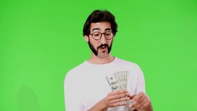 young crazy man with a rare beard and holding banknotes. cutout against green chroma key background