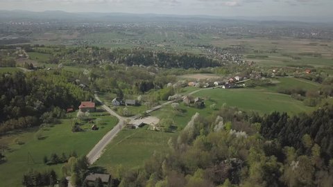 Kamenets, near Odjykon, Poland -april 28, 2018: Ancient ruins of a medieval castle against the backdrop of a natural landscape of the central strip of central Europe. View of drone. Panorama of fly.