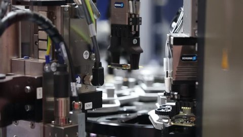 Hannover, Germany - April, 2018: Schunk assembly electronics line on Messe fair in Hannover, Germany