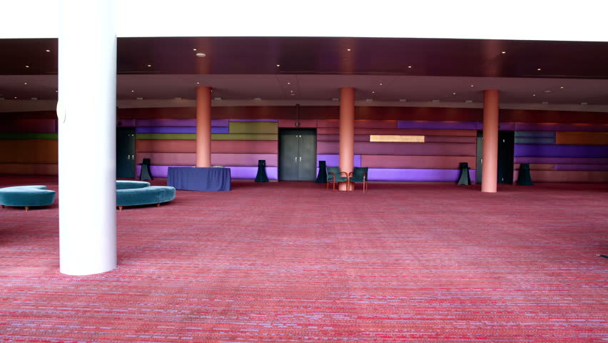 Waiting area in foyer by hall of theatre.