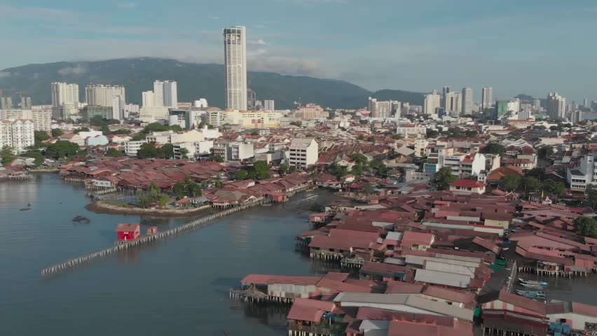 Aerial view of Clan Jetties along the waterfront of George Town, Penang, Malaysia, represents a unique settlement by Chinese immigrants who share common historical, geographical and lineage origin.